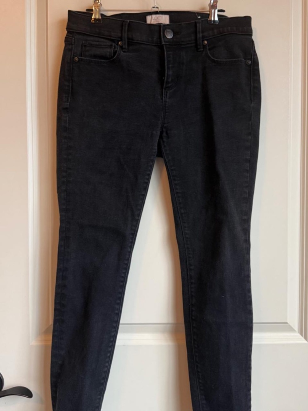 Size 4 Petite black skinny jeans from Loft